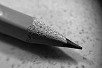A black and white image of  sharpened no. 2 pencil.